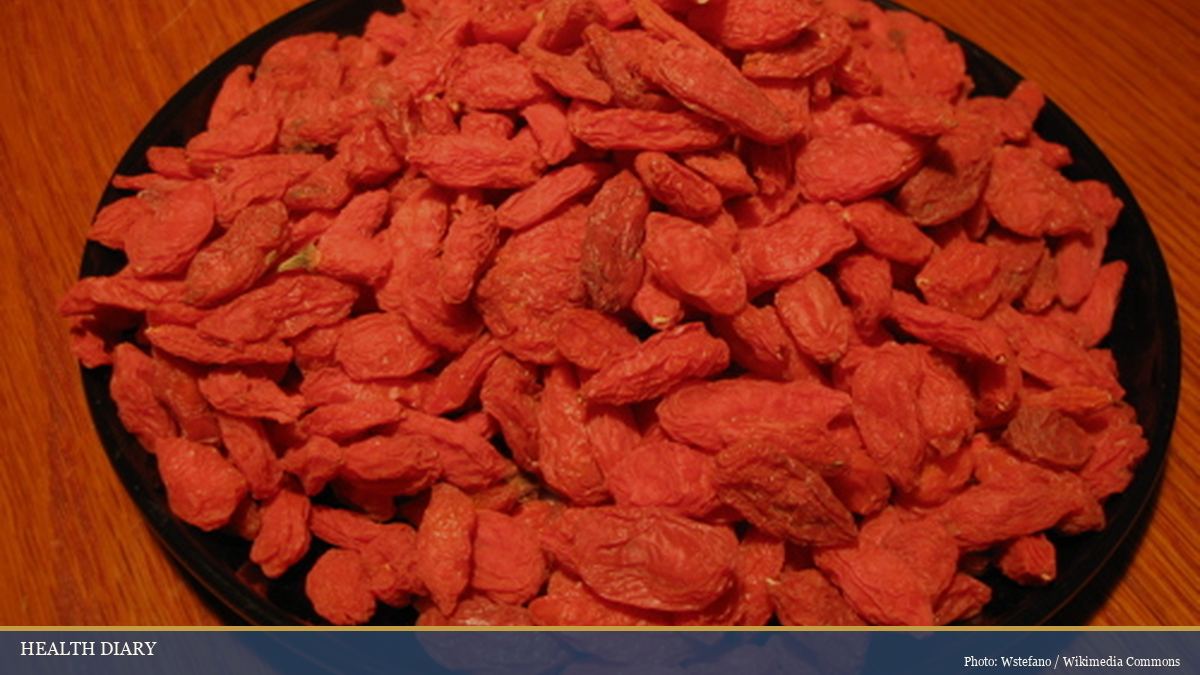 Plate of dried wolfberries goji used in traditional Chinese cooking and tonic teas