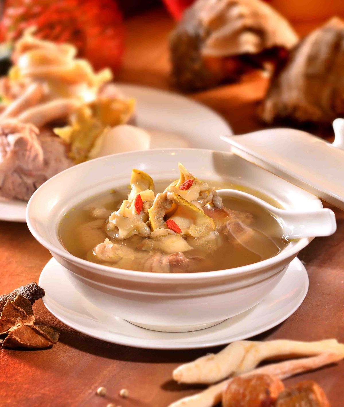 Herbal tonic soup with codonopsis root, red dates and goji berries
