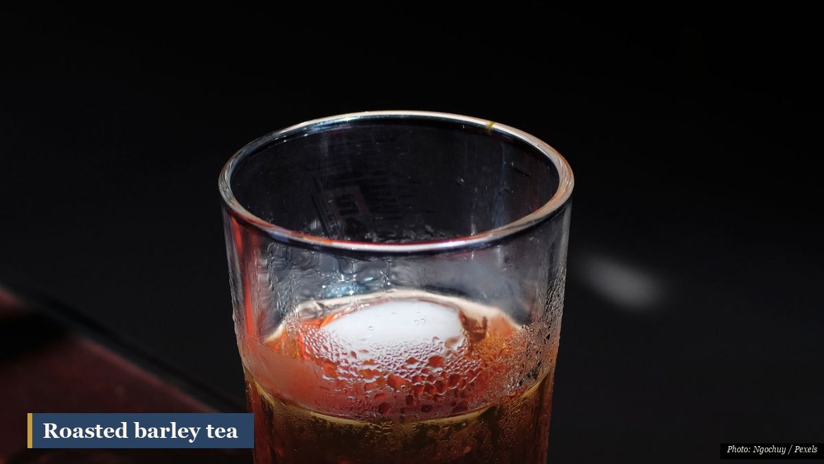 Chilled amber roasted barley tea in glasses with ice, an everyday caffeine-free cooling summer drink