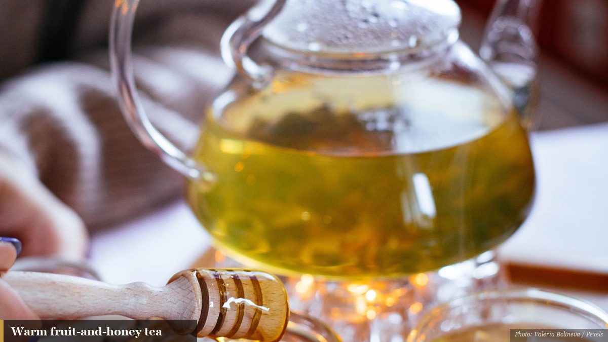 Warm amber citron-and-honey tea in a glass teapot, a wintertime favorite