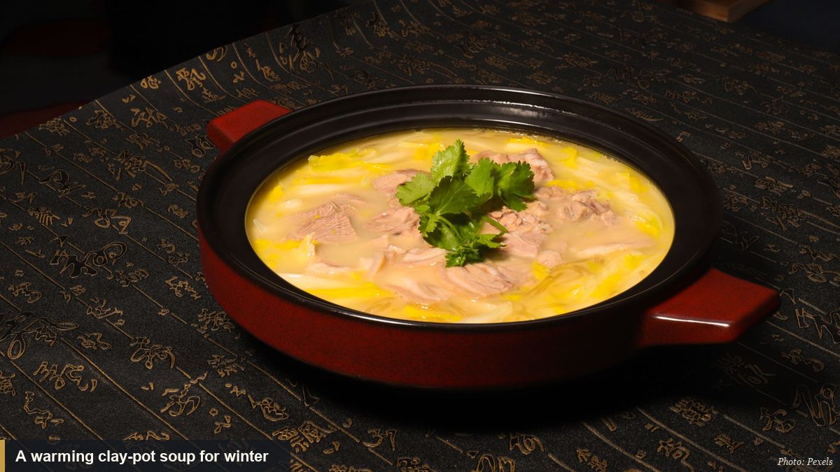 A warming clay-pot vegetable and meat soup for cold winter days