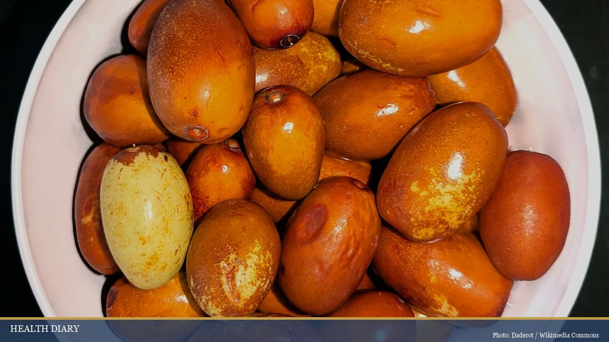 Bowl of dried red jujube dates traditionally used in Chinese nourishing soups and teas
